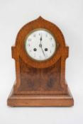 Early 20th century mantel clock with plain enamelled dial with Arabic numerals to a twin train