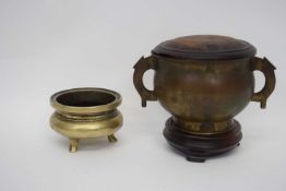 Chinese metal censer with Xuande mark to base on wooden stand with cover, together with further