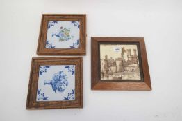 Framed sepia tile of Caernarvon Castle together with two framed other tiles, probably 18th