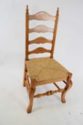 Set of eight reproduction oak ladderback and rush seated dining chairs with cabriole legs and turned