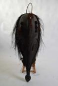 Tribal/ethnographica interest - a large Papua New Guinea gable mask formed as a beaked bird style