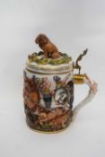 Naples or Capo di Monte tankard with battle scene and the cover with lion finial