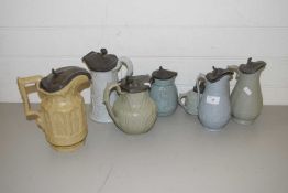 COLLECTION OF SIX VICTORIAN PEWTER LIDDED JUGS AND FURTHER TEA POT