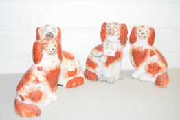 FOUR VARIOUS STAFFORDSHIRE MODEL SPANIELS