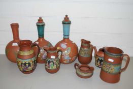 COLLECTION OF VARIOUS VICTORIAN DECORATED TERRACOTTA JUGS, DECANTERS AND OTHER ITEMS