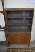 EARLY 20TH CENTURY OAK BOOKCASE CABINET WITH SLIDING GLASS DOORS OVER A CUPBOARD BASE, 137CM WIDE