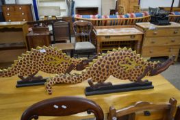 TWO SOUTH EAST ASIAN PAINTED WOODEN MODELS OF PANGOLINS, 92CM LONG