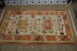 SMALL WOOL FLOOR RUG WITH CENTRAL PALE PANEL DECORATED WITH LOZENGES, 148 X 87CM