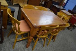 20TH CENTURY PINE RECTANGULAR KITCHEN TABLE ON TURNED LEGS TOGETHER WITH SIX ACCOMPANYING DINING