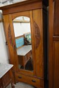 VICTORIAN AMERICAN WALNUT SINGLE DOOR WARDROBE WITH MIRRORED DOOR, CARVED DETAIL AND SINGLE BASE