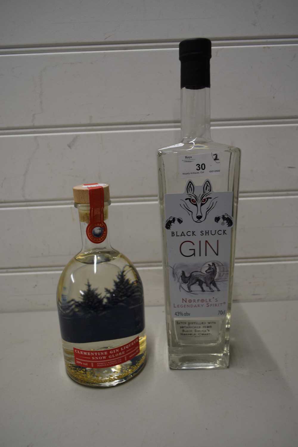 MIXED LOT: A BOTTLE OF MARKS AND SPENCER CLEMENTINE GIN LIQUEUR, BOTTLE OF BLACK SHUCK GIN (FIRST