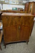 EARLY 20TH CENTURY WALNUT VENEERED TWO-DOOR CUPBOARD ON CABRIOLE LEGS, 92CM WIDE