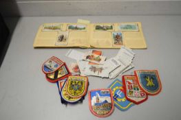 1939 CYCLING CIGARETTE CARDS IN BOOK T/W CLOTH BADGES AND FURTHER CIGARETTE CARDS