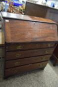 19TH CENTURY MAHOGANY BUREAU WITH FITTED INTERIOR AND FALL FRONT OVER A FOUR DRAWER BASE