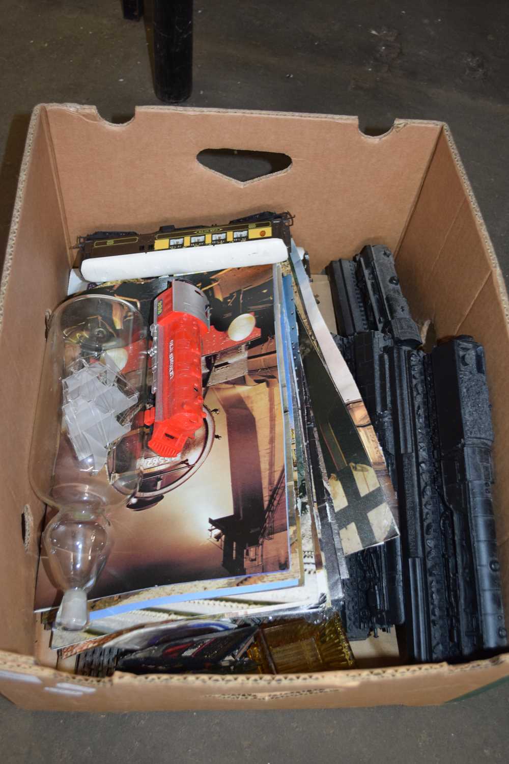 BOX CONTAINING SHIP IN GLASS BOTTLE AND RESIN MODELS OF RAILWAY ENGINES ETC