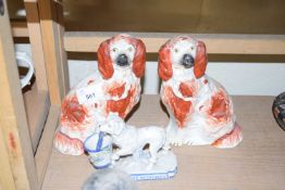 PAIR OF VICTORIAN STAFFORDSHIRE SPANIELS, TOGETHER WITH A FURTHER SMALL DOG ORNAMENT (3)