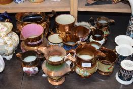 QUANTITY OF LUSTRE WARE JUGS WITH TYPICAL DESIGNS