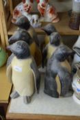 SIX VARIOUS WOODEN PENGUINS