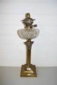 OIL LAMP WITH FROSTED GLASS SHADE, CLEAR GLASS FONT AND A BRASS CORINTHIAN COLUMN BASE