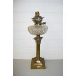 OIL LAMP WITH FROSTED GLASS SHADE, CLEAR GLASS FONT AND A BRASS CORINTHIAN COLUMN BASE