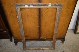 Gilt frame with running pattern. 39x22.5ins. Approx.