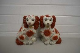 PAIR OF STAFFORDSHIRE STYLE MODEL SPANIELS