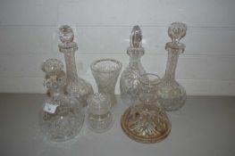 FIVE VARIOUS DECANTERS PLUS COVERED JAR AND A VASE