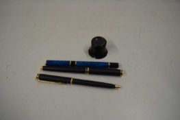 TWO VINTAGE WATERMAN FOUNTAIN PENS AND A FURTHER WATERMAN BALLPOINT PEN PLUS A SMALL MAGNIFIER (4)