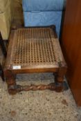 EARLY 20TH CENTURY CANE TOPPED AND BARLEY TWIST FRAMED STOOL, 44CM WIDE