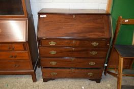 19TH CENTURY MAHOGANY BUREAU WITH FITTED INTERIOR AND FALL FRONT OVER A FOUR DRAWER BASE