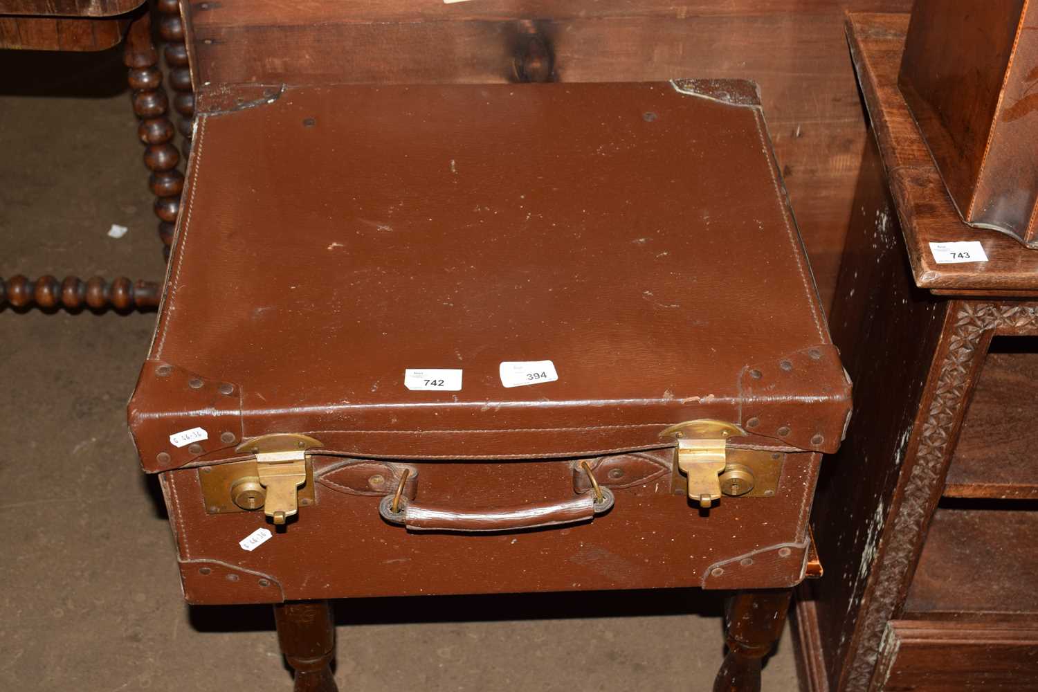 BROWN LEATHER SUITCASE