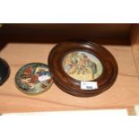 TWO PRATTWARE POT LIDS, ONE WITH WOODEN SURROUND
