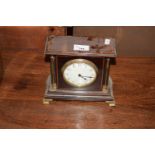 EDWARDIAN MAHOGANY CASED MANTEL CLOCK WITH PILLARED SIDE SUPPORTS