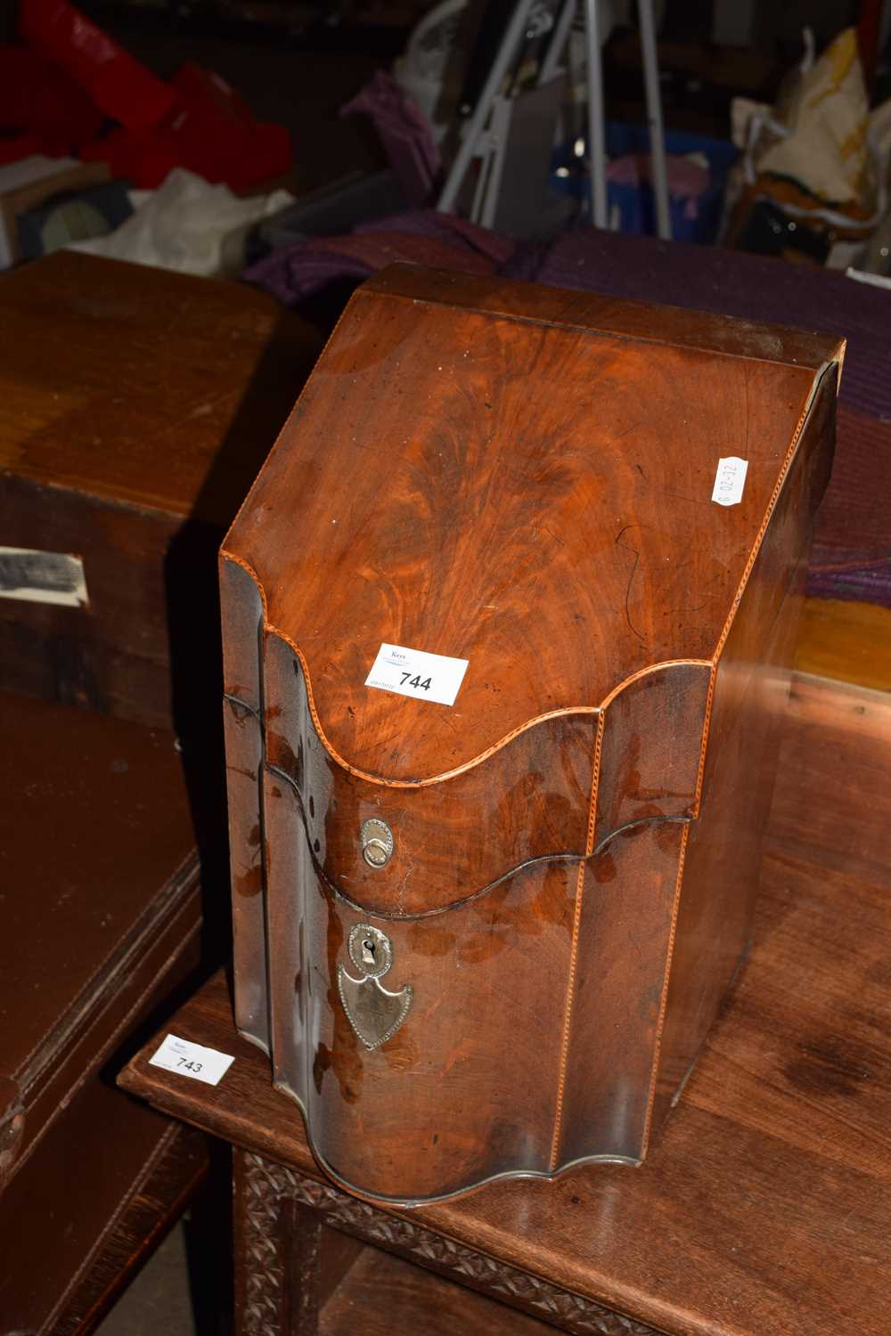 GEORGIAN MAHOGANY VENEERED WEDGE FORMED KNIFE BOX, LACKING INTERIOR FITTINGS