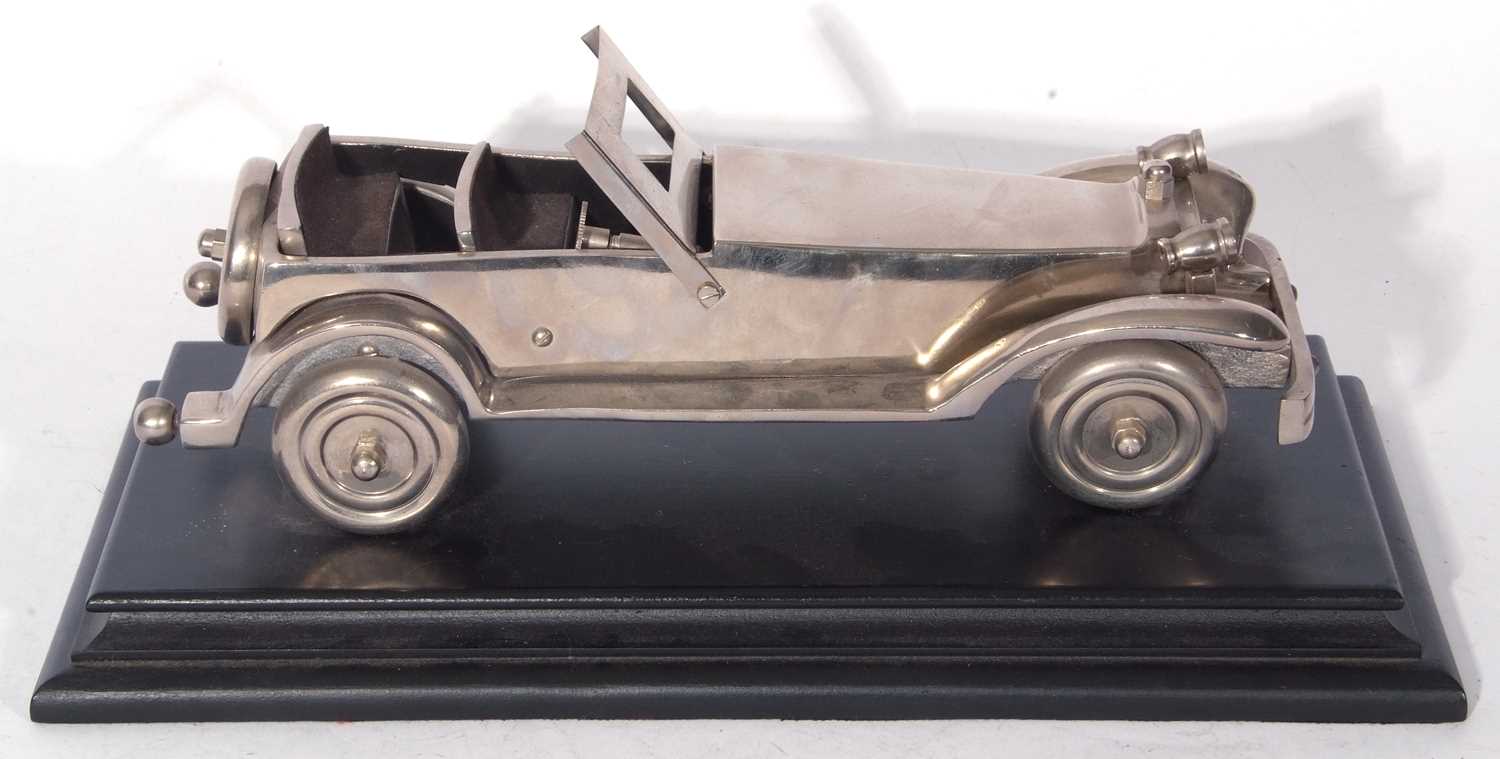 Cast metal model of a open topped vintage sports car set on an ebonised plinth base, the base 35cm - Image 4 of 5
