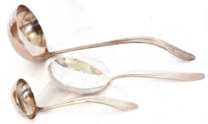 Group of three mid-20th century Dutch silver serving spoons with pointed ends to the handles,