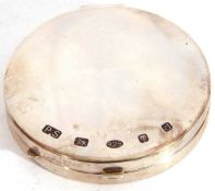 Elizabeth II silver mirrored compact, the hinged circular lid with oversized hallmarks London