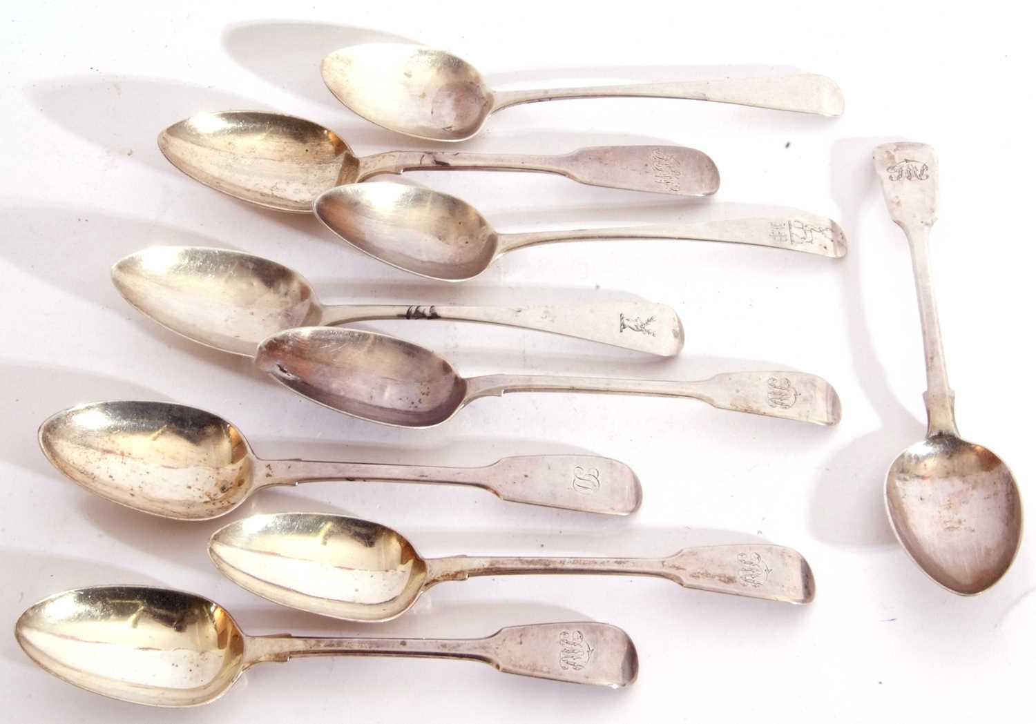 Mixed Lot: five Georgian Fiddle pattern dessert spoons, three Georgian Old English dessert spoons