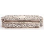 Victorian trinket box of shaped rectangular form, the lid elaborately embossed with floral