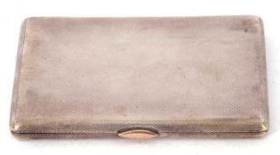 Art Deco silver cigarette case having overall engine turned decoration, push in gold coloured clasp,