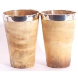 Pair of Victorian horn beakers of tapering cylindrical form, both applied with hallmarked silver