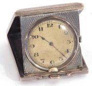 Antique 925 marked travel clock in engine turned folding case, the inside of the case with