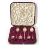 Cased set of six George V decorative coffee spoons with twist stems and fox mask finials, Birmingham