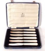 Cased set of six Elizabeth II mother of pearl handled and silver bladed cake or butter knives,