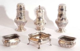 Mixed Lot: two silver casters with pull off pierced covers, the bodies decorated with medallions and