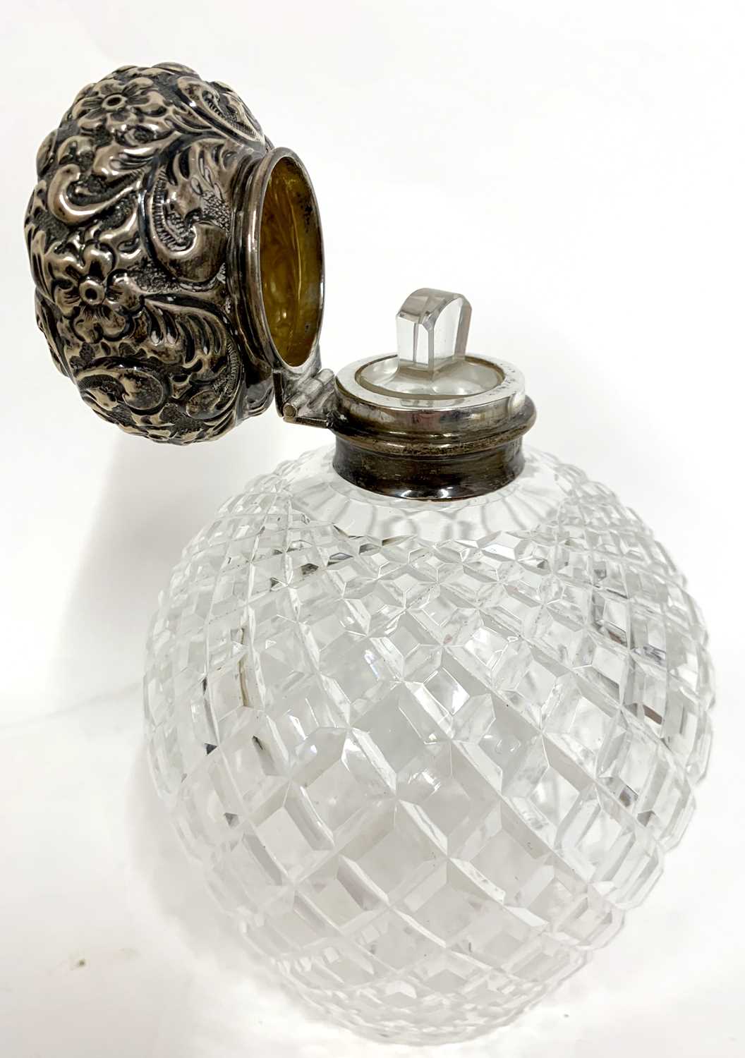 Edward VII spherical faceted cut glass scent bottle with hinged embossed silver lid, complete with - Image 2 of 2