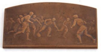 Bronze football medallion or plaque by C. Loudray, patinated and shaped, one of three sporting