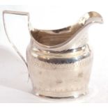 George III cream jug of helmet shape, the body embellished with bands of prick work engraved