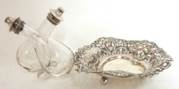 Late Victorian pierced and embossed bon-bon dish of heart shape with plain centre and raised on