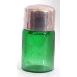 Antique green glass smelling salts bottle of cylindrical form with screw on silver lid, hallmarked